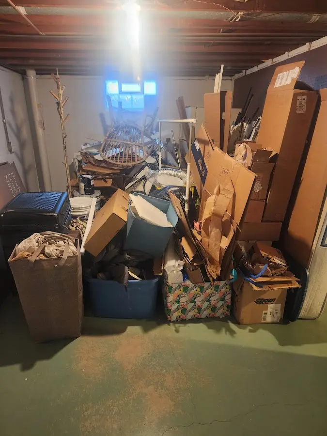 Roll-off dumpster container at job site for 15 Yard Dumpster Rental in Hazle